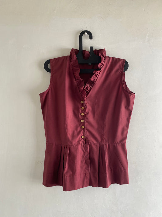 Sleeveless peplum top